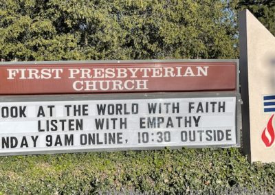 church marquee message: look at the world with faith, listen with empathy